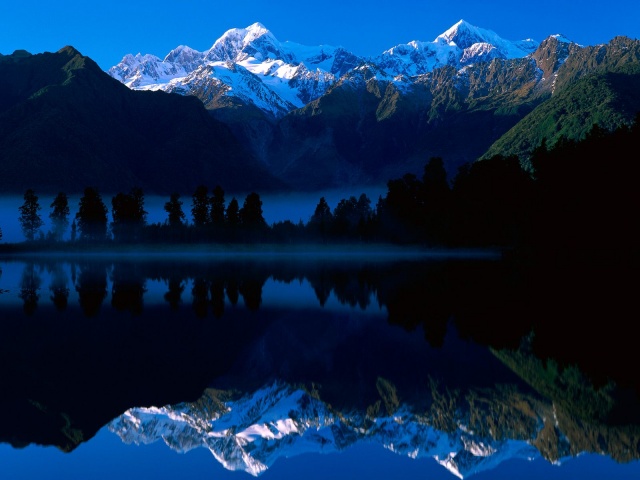 Android tapety - lake_matheson_reflects_mount_tasman_and_mount_co-640x480.jpg